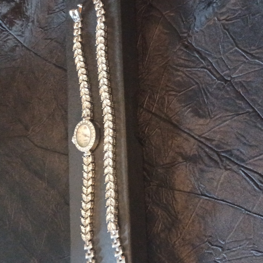Brand new watch and bracelet set,silver with rhinestones